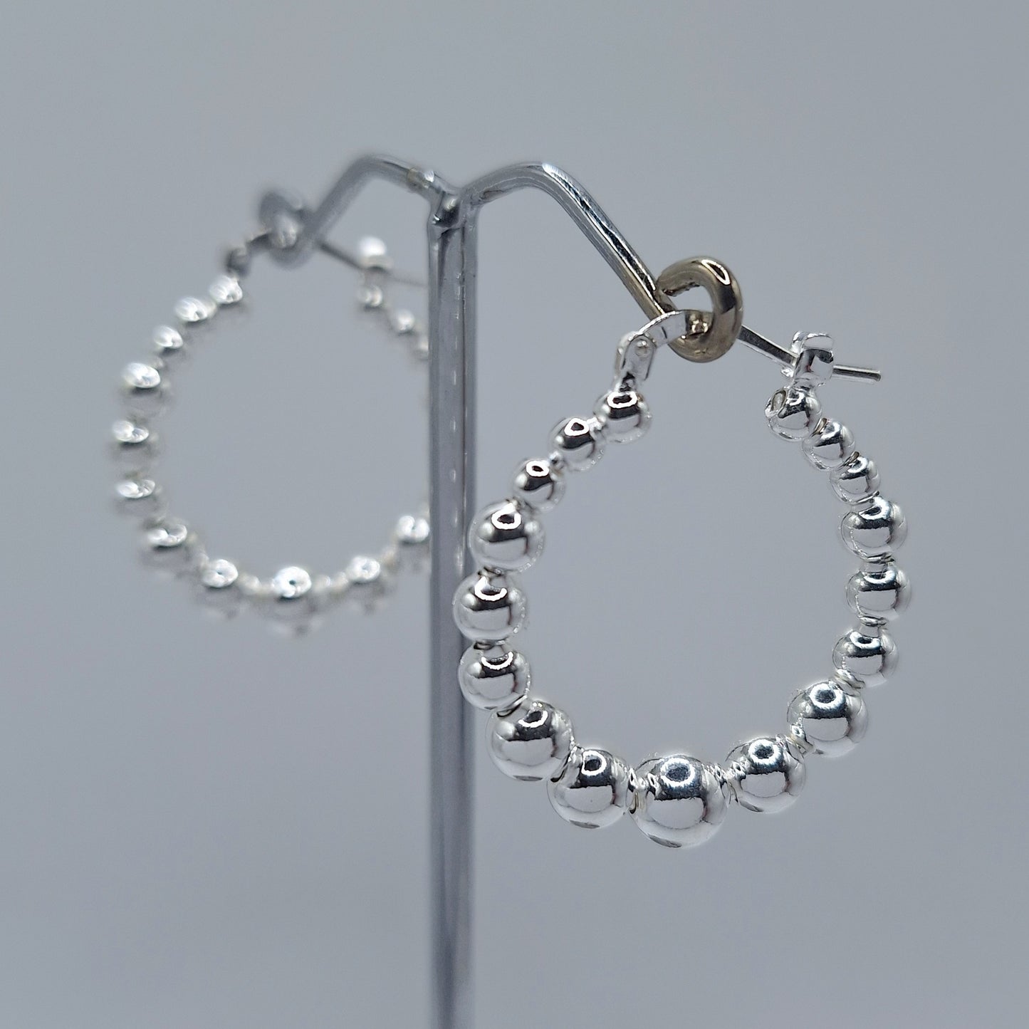 Silver bubble hoop earrings.  Made in nz. Jewelry