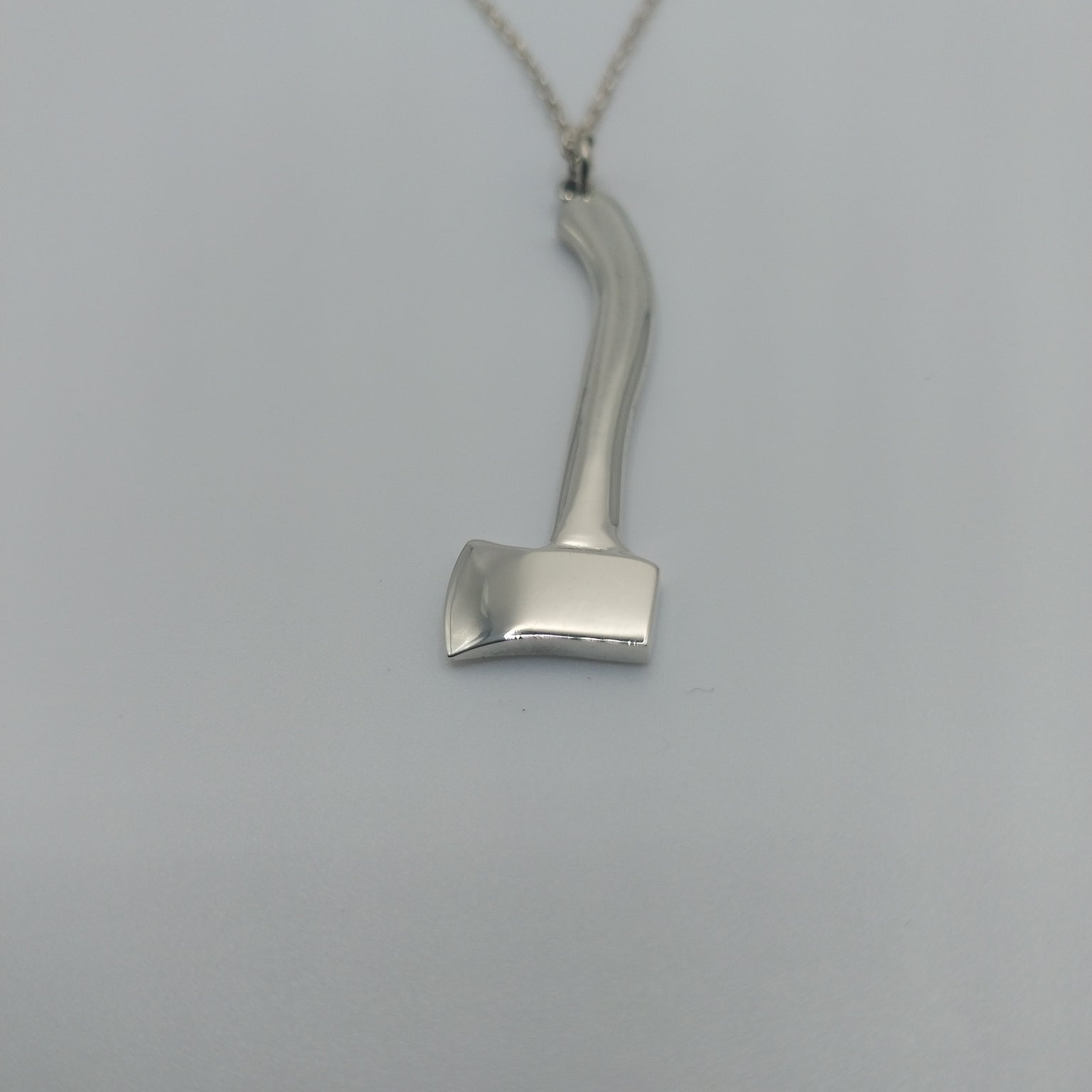Handmade silver axe necklace