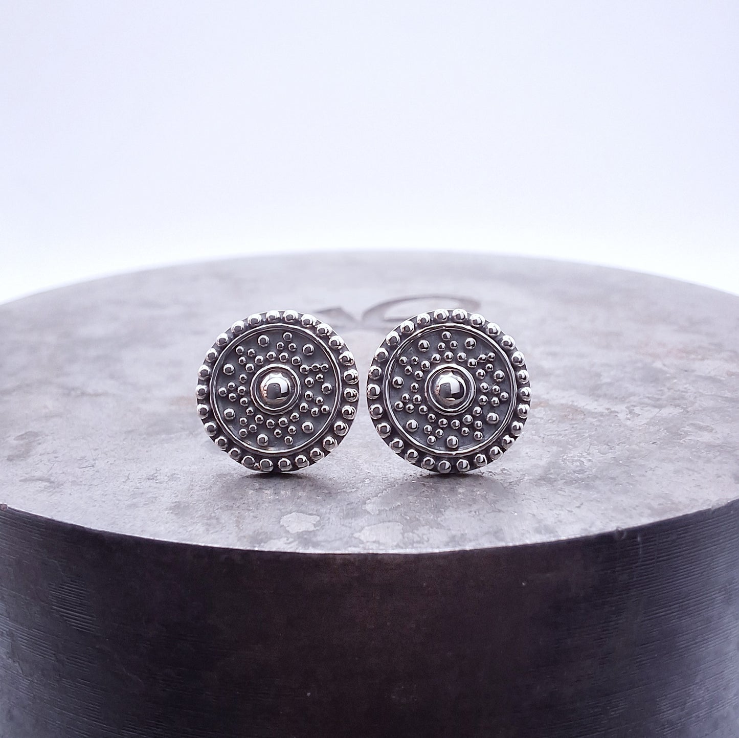 Sterling silver Mandala studs.
A symbol in budhism representing the perfect universe.