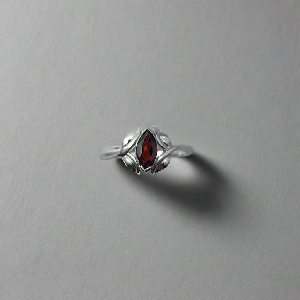Silver garnet solitaire
