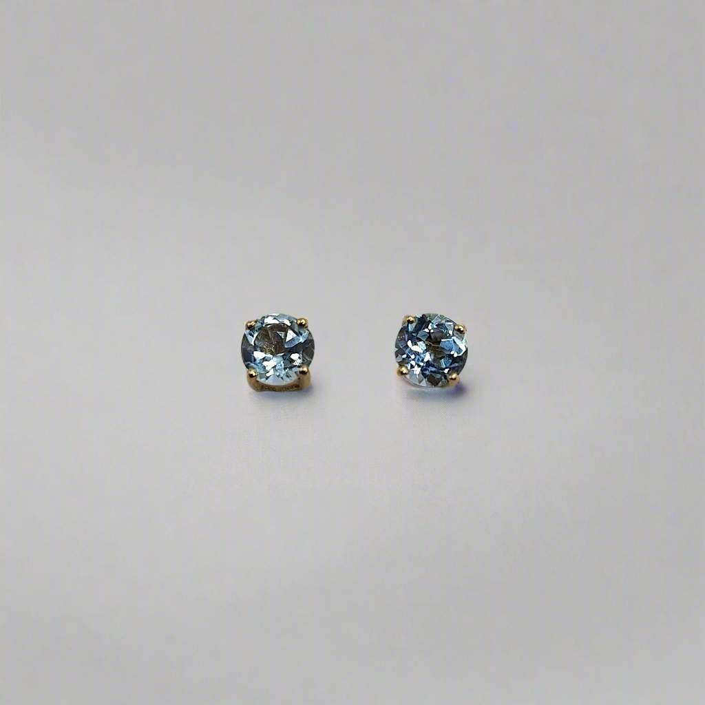 9ct blue topaz studs