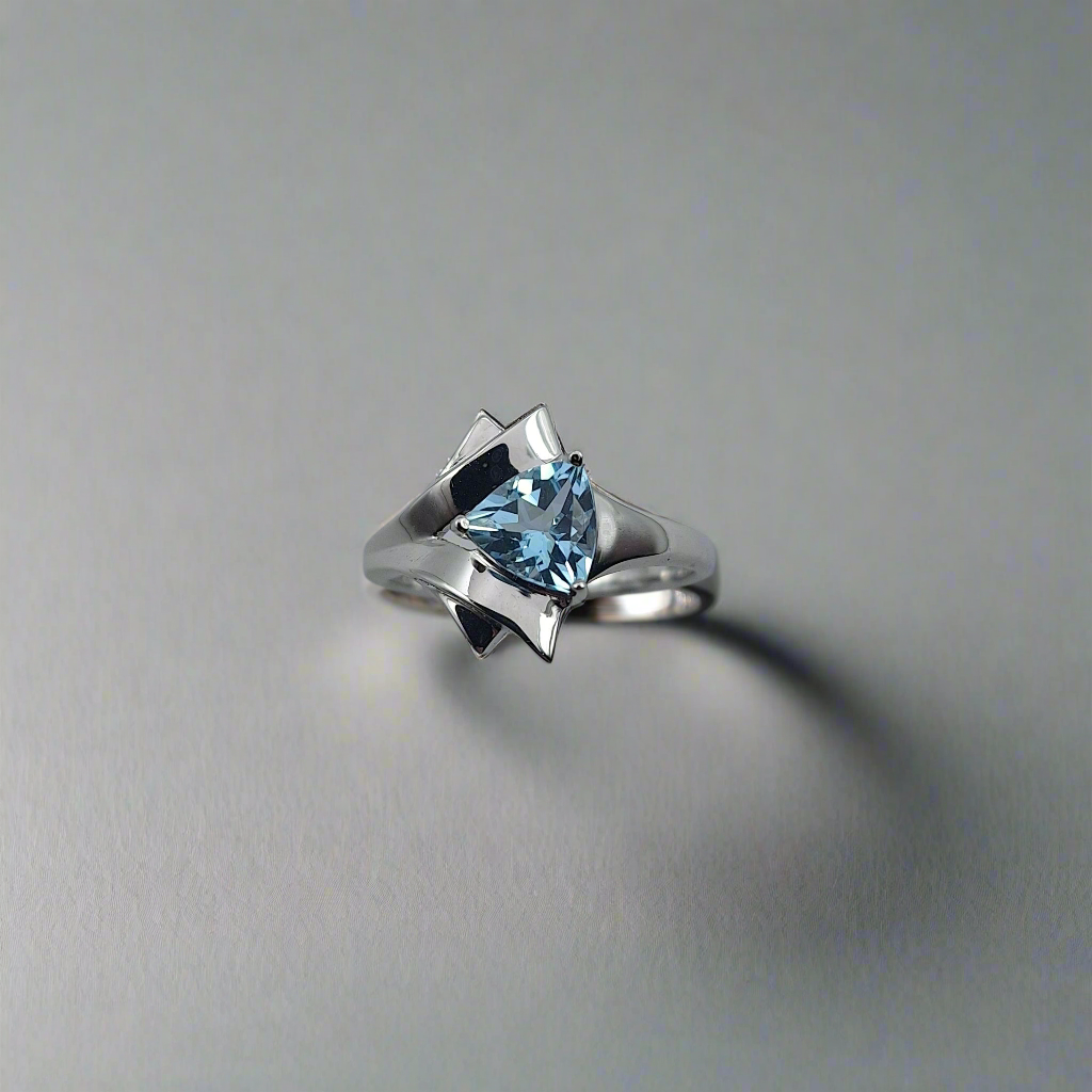 Art deco inspired silver blue topaz ring