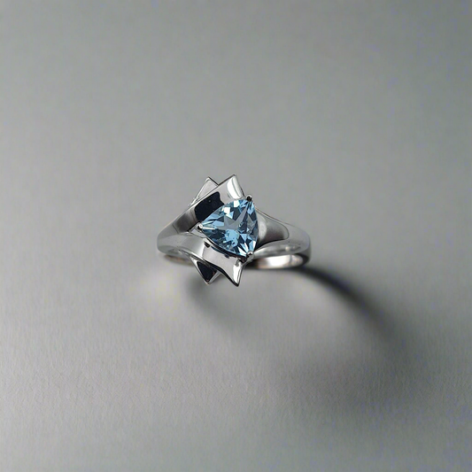 Art deco inspired silver blue topaz ring